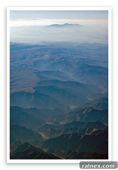 fly13 fly13 - Detailed aerial photo of rugged, snow-dusted mountains