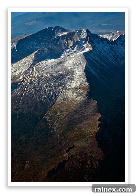 fly25 fly25 - Mountain peak with minimal snow coverage