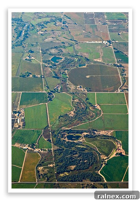 fly22 fly22 - Aerial view of plains and scattered clouds during flight