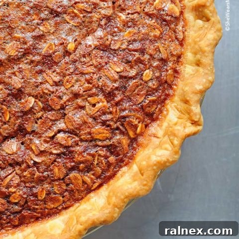 Oatmeal Pie is a delightful, comforting dessert that rivals Pecan Pie, perfect for any dessert menu.