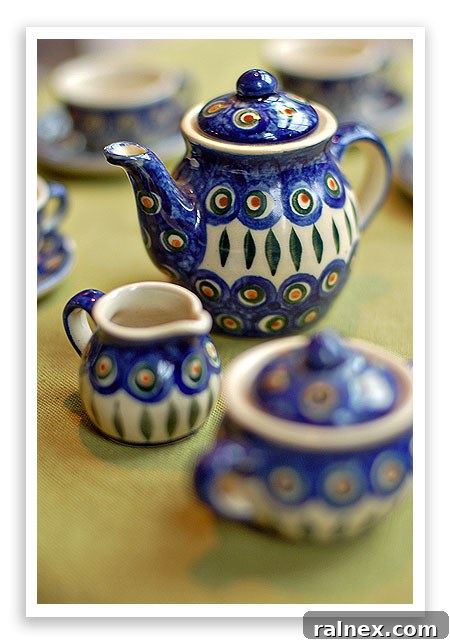 An inviting spread of Polish Pottery dishes, including a large bowl and plates, adorned with classic blue floral patterns.