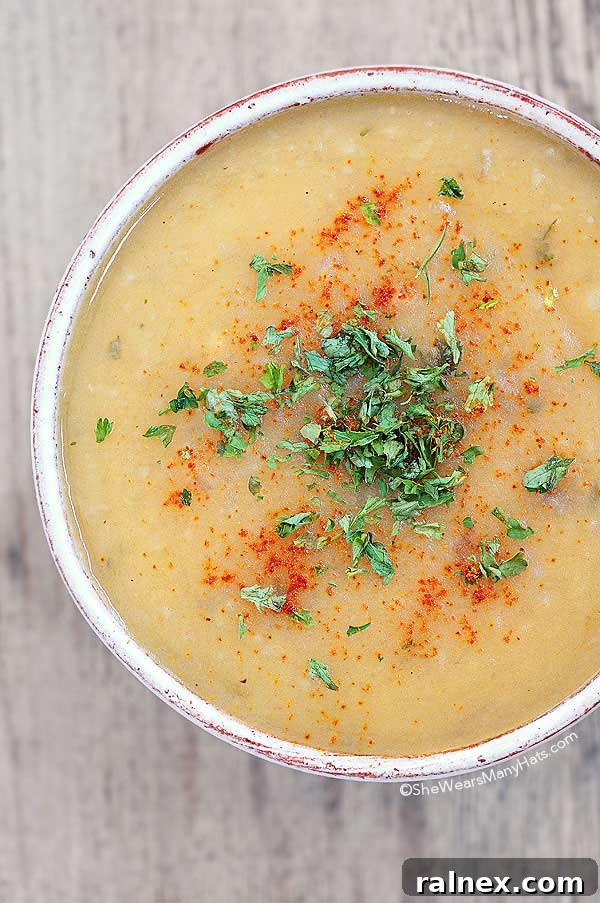 Perfect Potato Soup ready to serve in a rustic setting