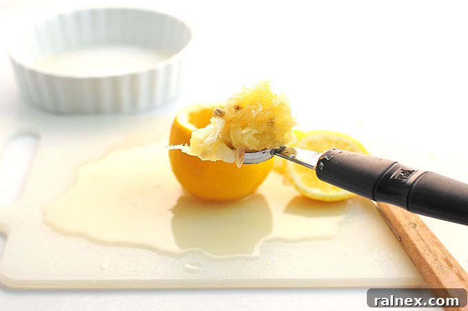 Crafting Irresistible Lemon Cups 10 Step 9: A fully hollowed lemon cup, clean and perfectly prepared, ready for filling.