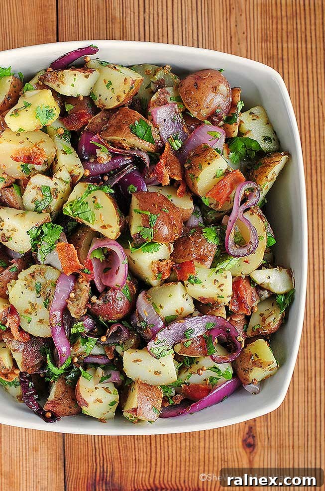 New potato salad with grilled onions and bacon