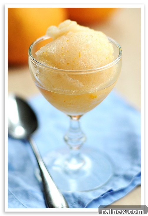 Grapefruit sorbet in a bowl, styled for Pinterest.